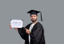 Indian student reviewing Credila education loan documents with calculator and laptop