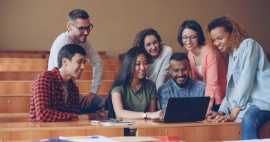 Students from diverse backgrounds engaged in collaborative learning environment