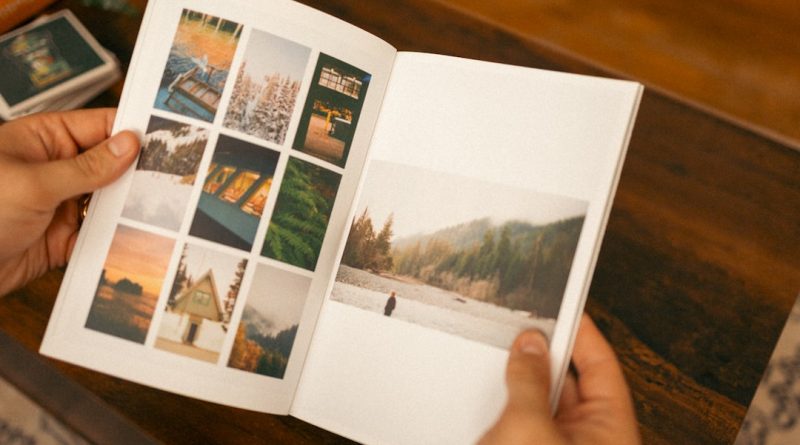 Students holding high school yearbooks and looking at memories together