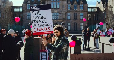 Teachers gathered at education advocacy event demonstrating support for union rights