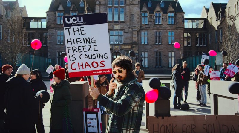 Teachers gathered at education advocacy event demonstrating support for union rights