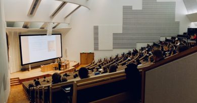 Students engaged in hands-on learning activities in a classroom without excessive screen usage