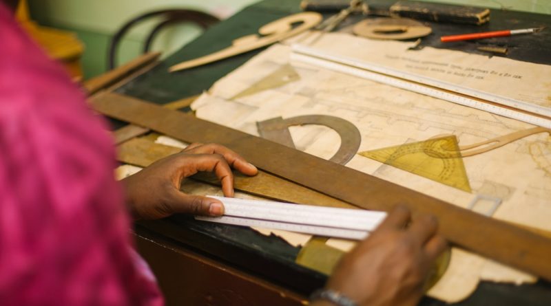 Student attending class for scholarship eligibility requirements