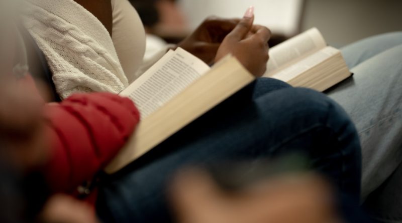 Students from different backgrounds studying together in a classroom