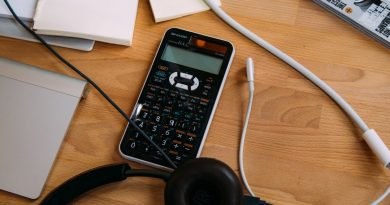 Student reviewing education loan documents and financial aid options