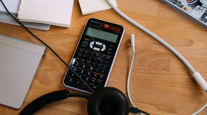 Student reviewing education loan documents and financial aid options