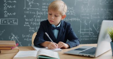 Teacher using AI technology with students in modern classroom environment