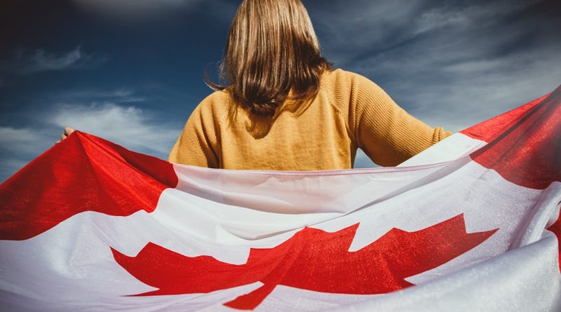 International students studying in Canada with Canadian flag