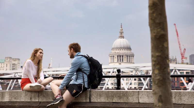 Student studying with UK flag and Chevening Scholarship logo