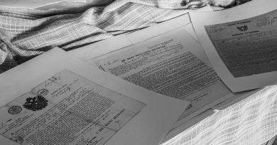 Student reviewing confusing college financial aid letter at desk