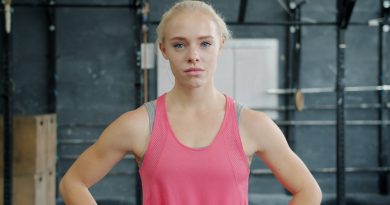 Female athlete competing in multi-event track and field competition