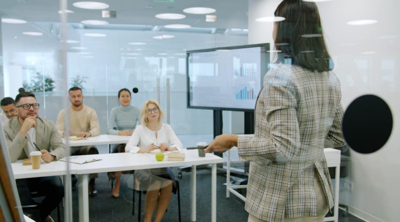 Education administrator analyzing student data across multiple disconnected systems