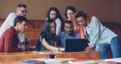 Students and educators collaborating in a modern classroom setting