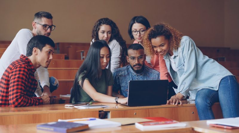 Students and educators collaborating in a modern classroom setting
