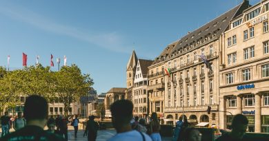 German university campus with international students studying outdoors