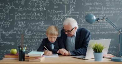 Teacher providing one-on-one tutoring support to a student in classroom setting