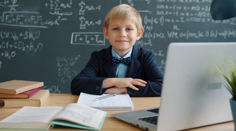 Students in a classroom with limited screen usage during lessons
