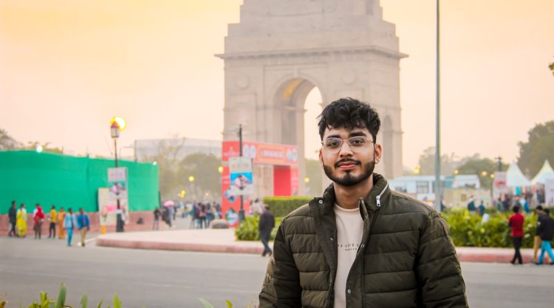 Indian students with laptops studying abroad in university library