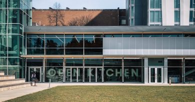 Indian students studying in Canadian university campus with fall leaves