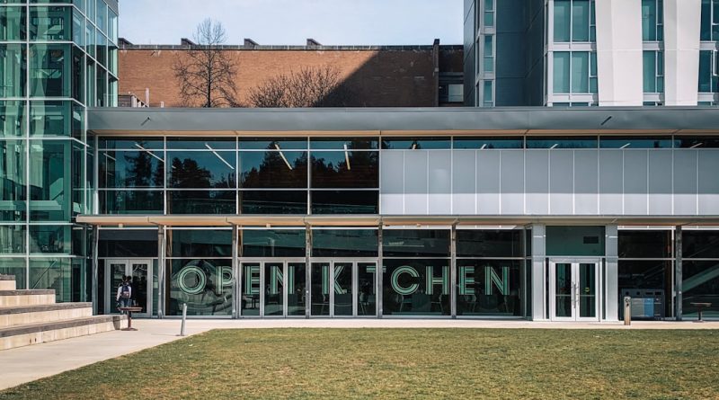 Indian students studying in Canadian university campus with fall leaves