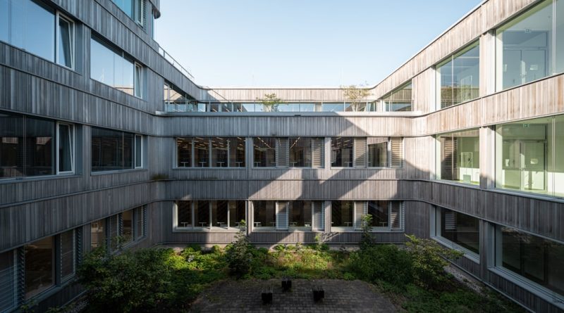 Indian students at German university campus with modern architecture