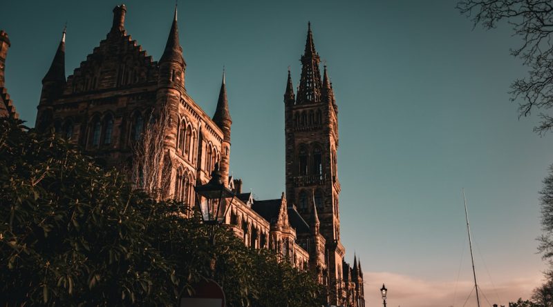Indian students studying at UK university campus with lecture halls and library