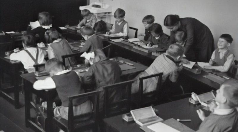 High school history classroom with students discussing American documents