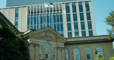 University of Toronto main campus building with students walking